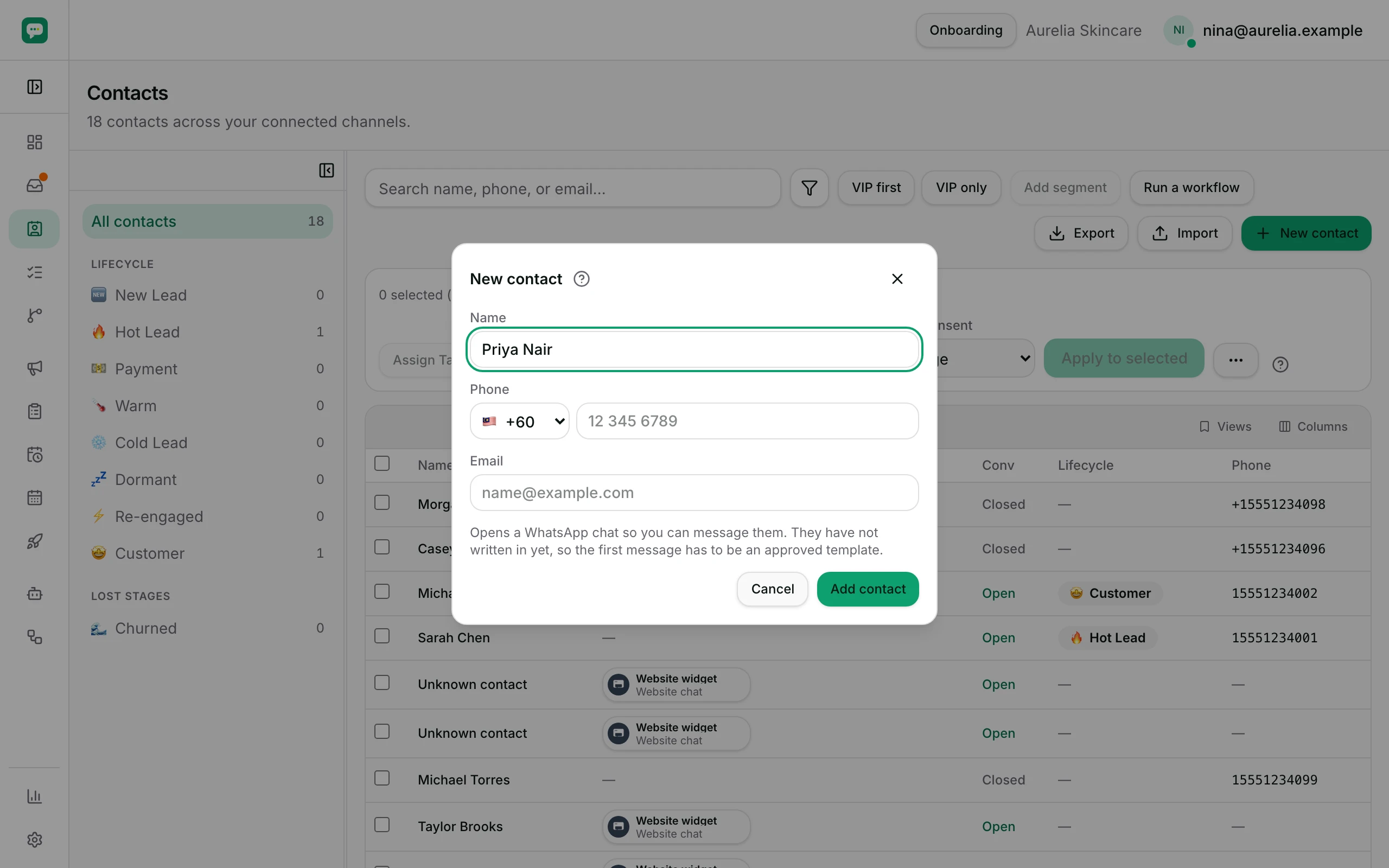 The New contact dialog, with Name, dialling code and Phone.