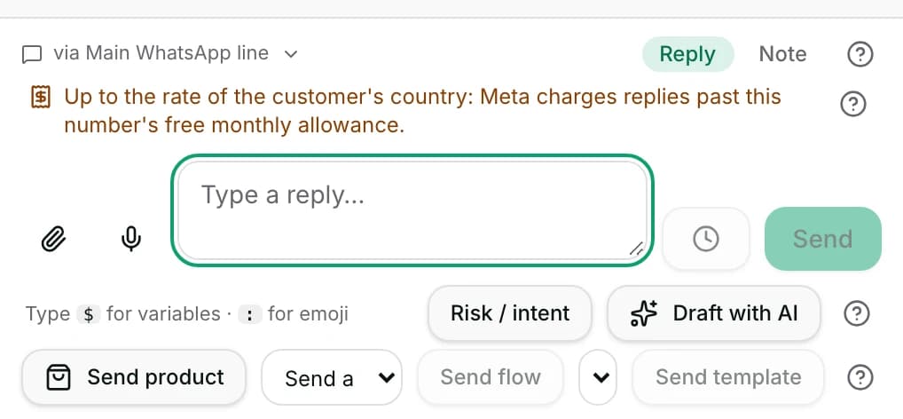 The reply box with the WhatsApp cost line above it and Draft with AI below.